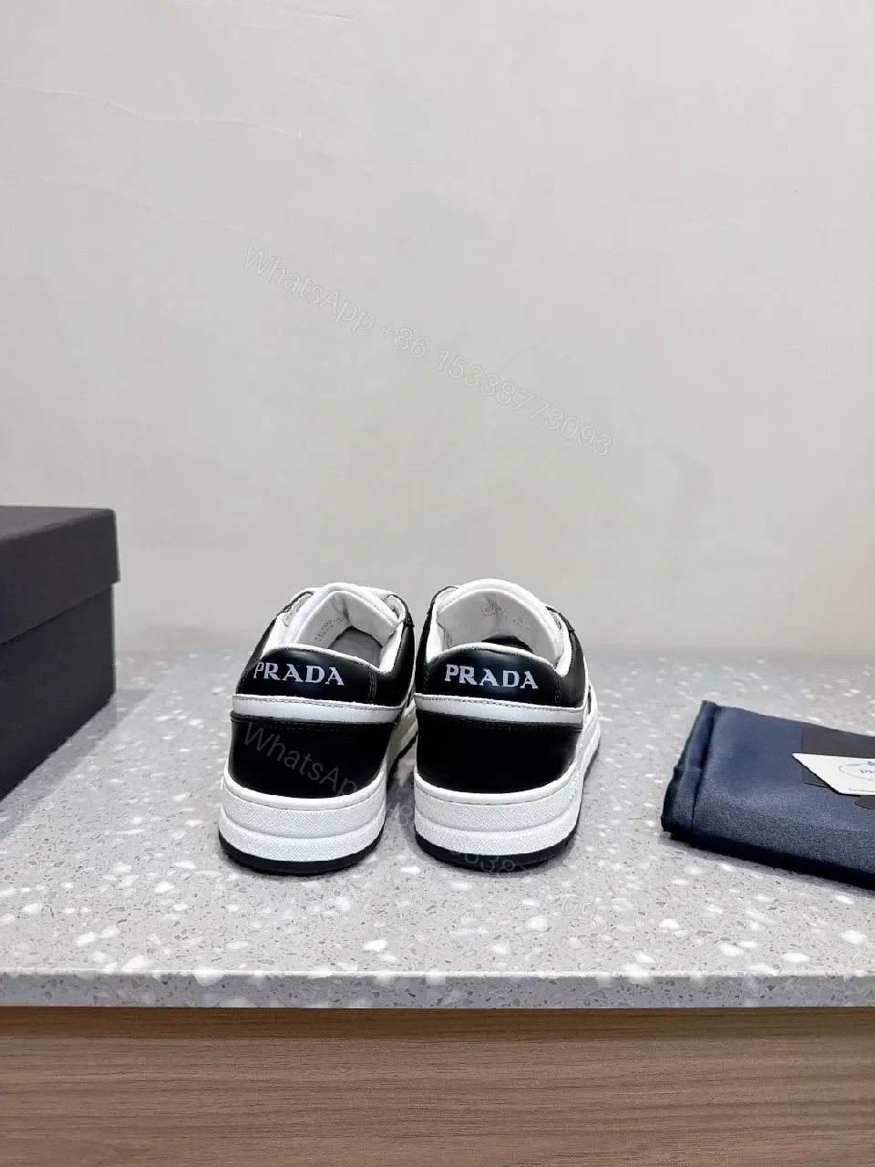View 4 of Monochrome Leather Sneaker with Subtle Designer Detailing