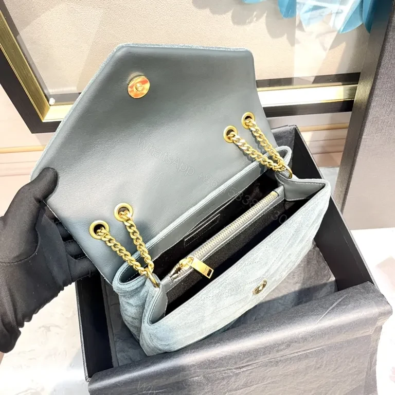 View 2 of Powder-Blue Suede Crossbody with YSL Monogram Gold Hardware