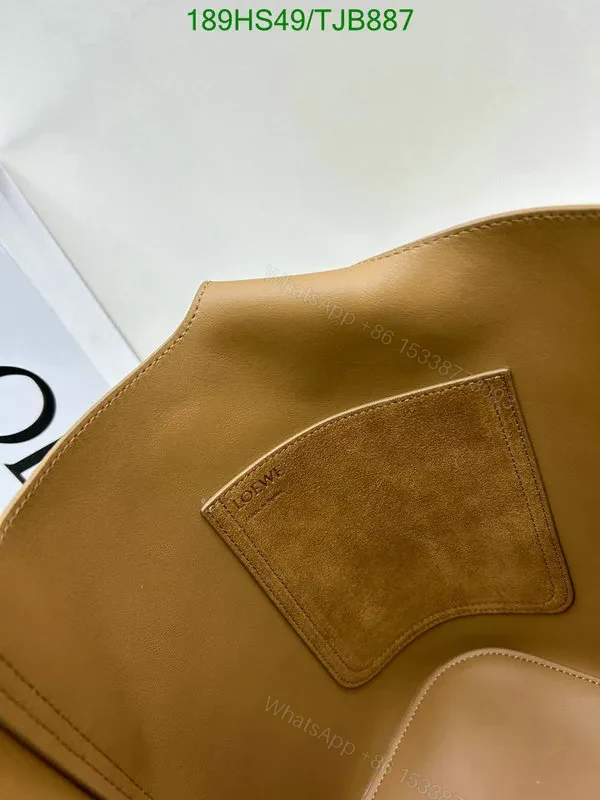 View 19 of Loewe Tobacco Pebble Bucket Bag crafted from Suede Calfskin EA5287