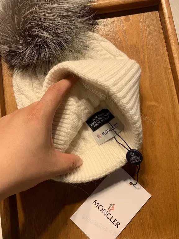 View 2 of Cozy Cable Knit Beanie with Fur Pom â€” Moncler Luxury Warmth