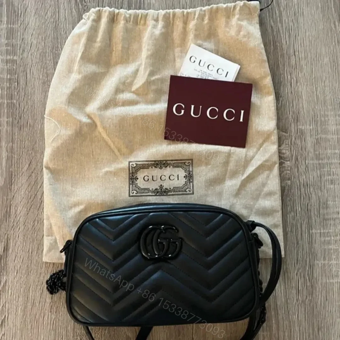 Gucci GG Marmont Matelassé Mini Camera Bag in black — view 1