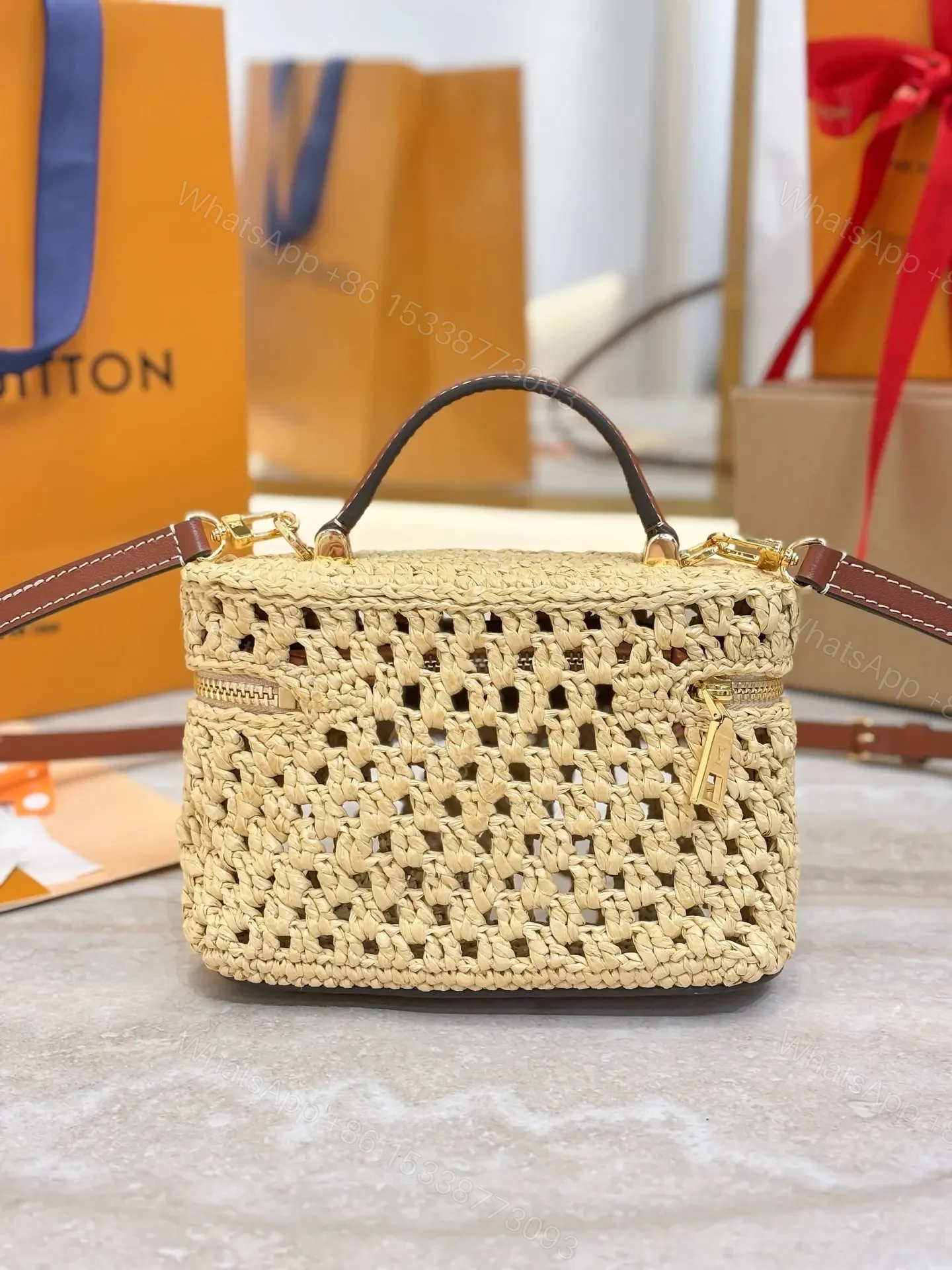 View 2 of Louis Vuitton Vanity Chain Pouch in raffia