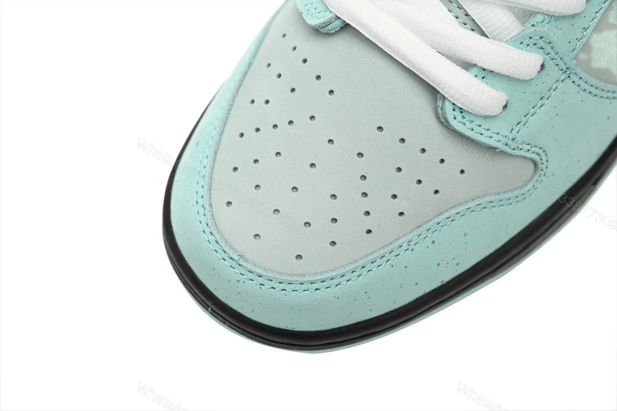 View 7 of CONCEPTS × Nike Dunk SB Low Lobster BV1310-402