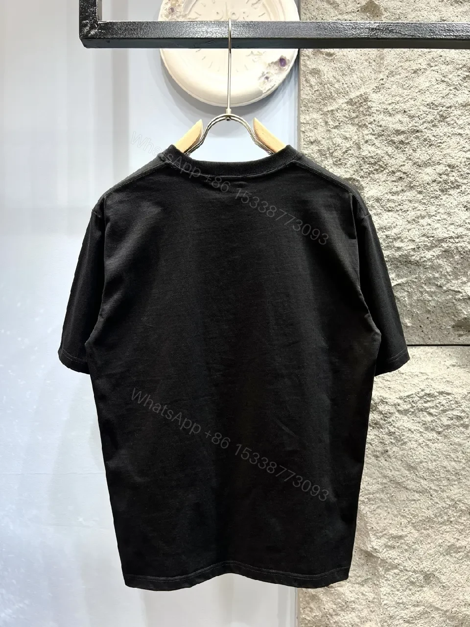 View 8 of Premium Cotton Graphic Tee - Black, Relaxed Fit, Bold Logo