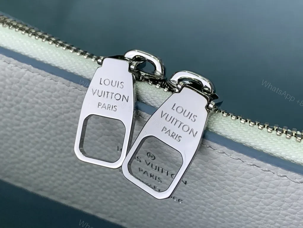 View 6 of Pebbled Leather Tote: LV Emblem, Structured, Spacious Carrier