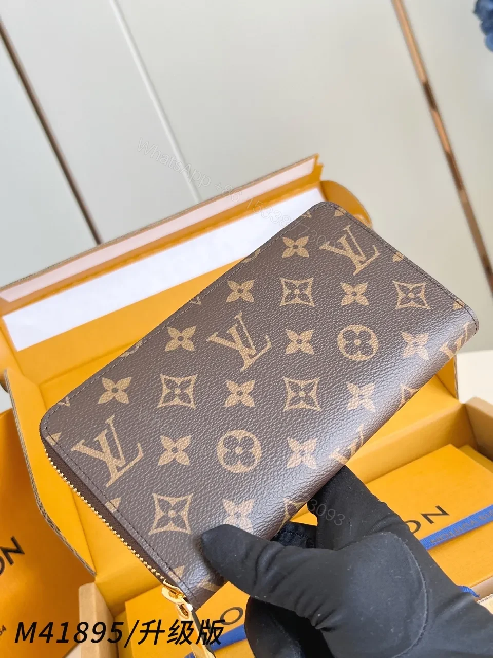 View 5 of Compact Monogram Leather Wallet: Signature Texture, Gold Zipper