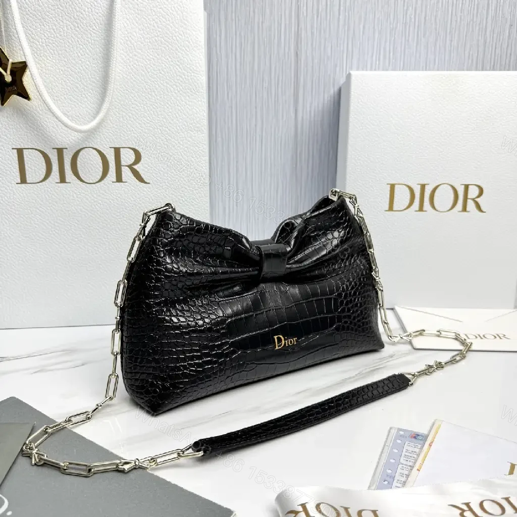View 8 of Croc-Texture Bow Clutch: Leather Luxury, All-Day Glam