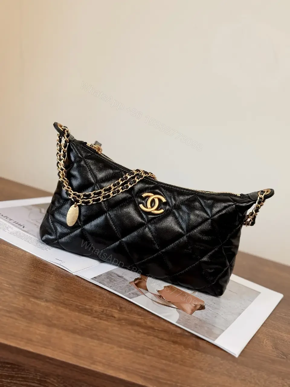 View 7 of Quilted Crossbody with Gold Emblem: Compact Luxury Bag