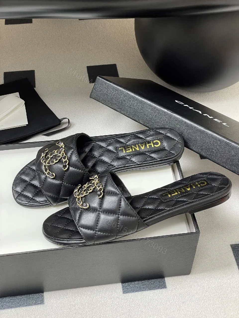 View 4 of Quilted Leather Slides with Gold Chain Detail Luxury