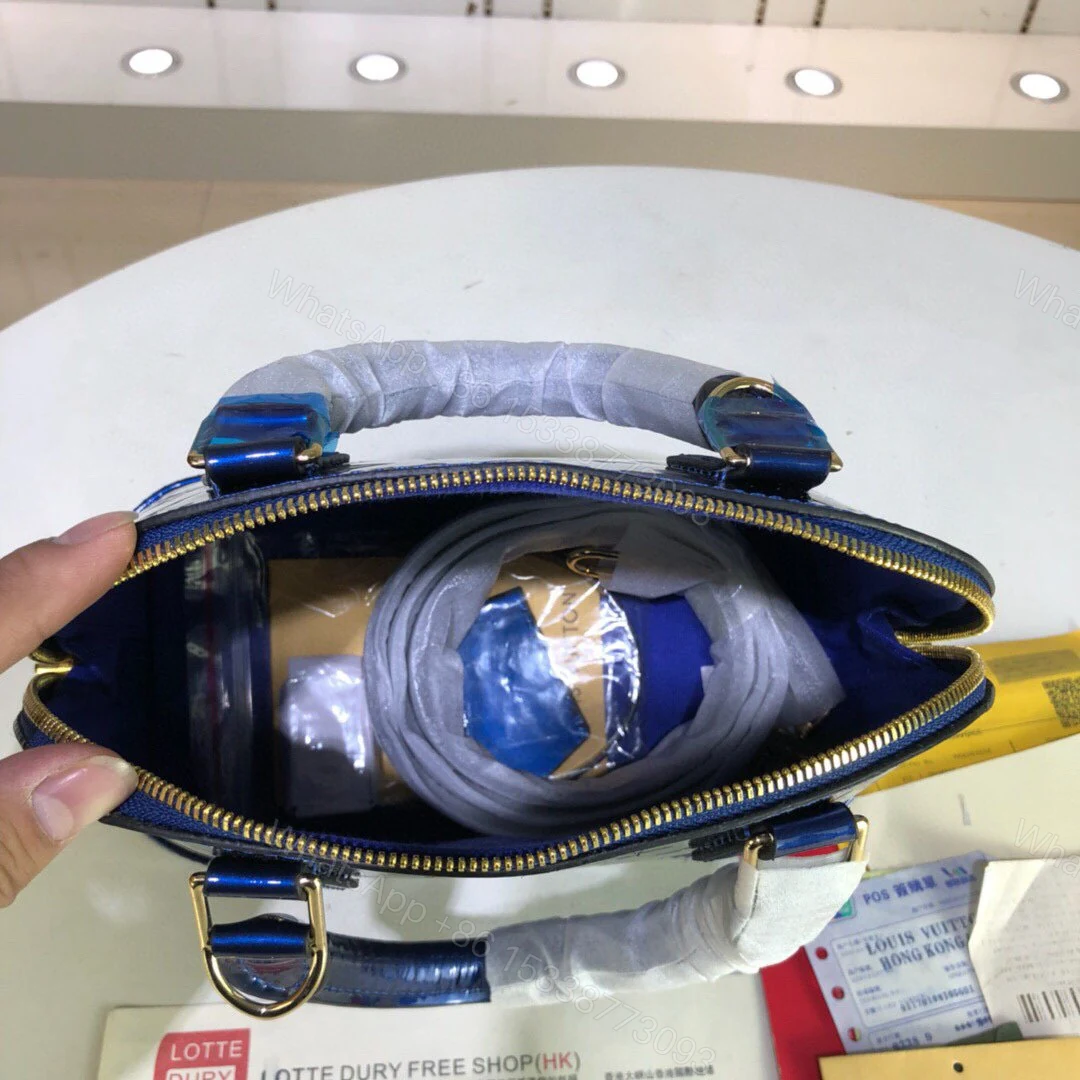 View 19 of Louis Vuitton Alma