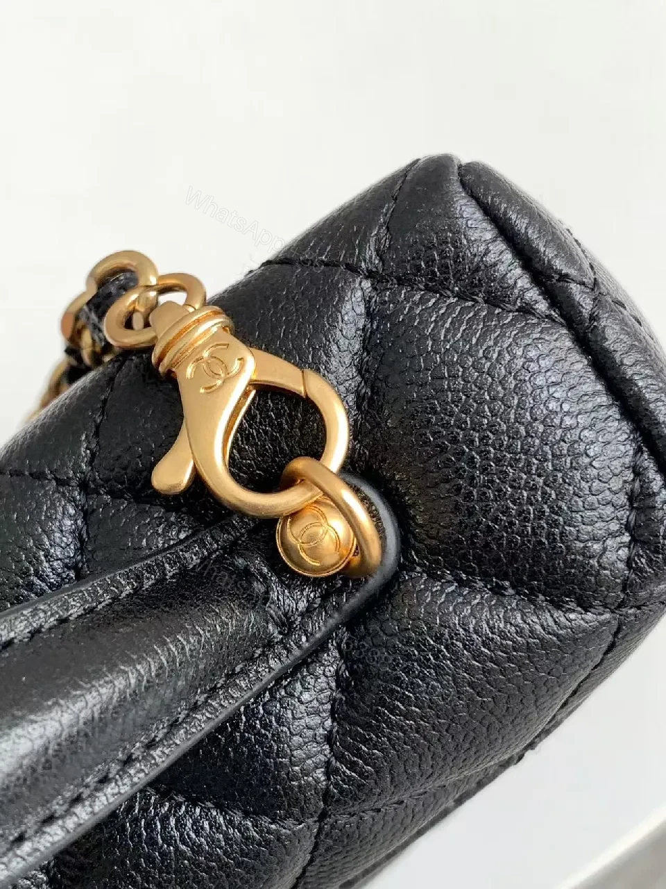 View 6 of Quilted Black Bag with Gold Hardware - Chic Compact Style