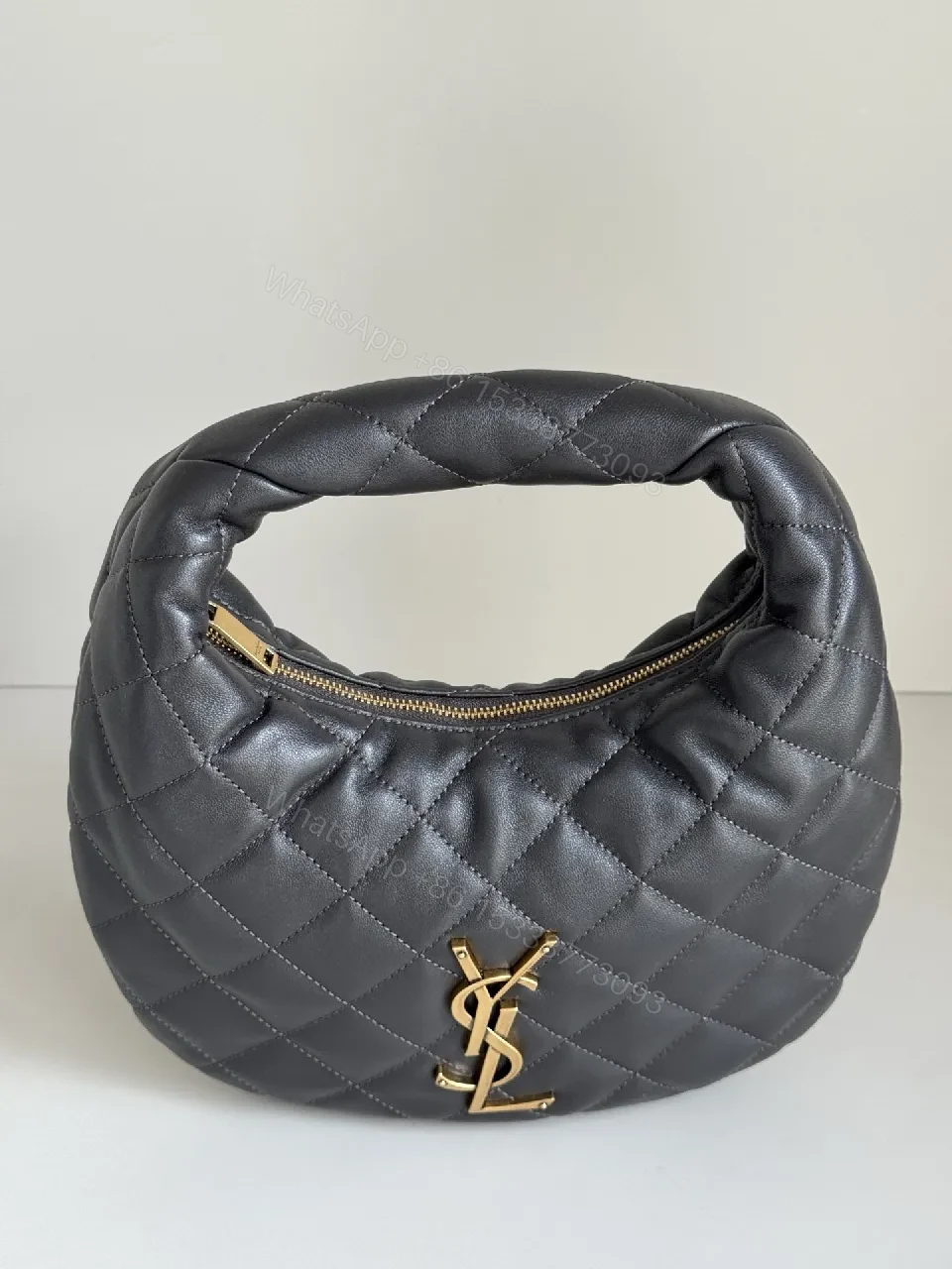 View 6 of Quilted Mini Bag with Gold Logo – Elegant Everyday Carry