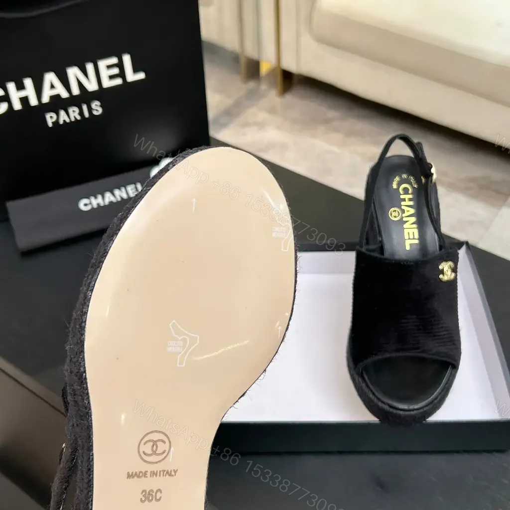 View 10 of Chic Black Textured Slingback Sandals with Gold Logo