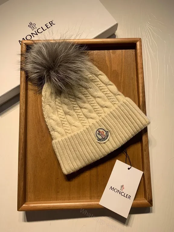 View 2 of Cream Cable-Knit Beanie with Faux-Fur Pom-Pom: Moncler Warmth