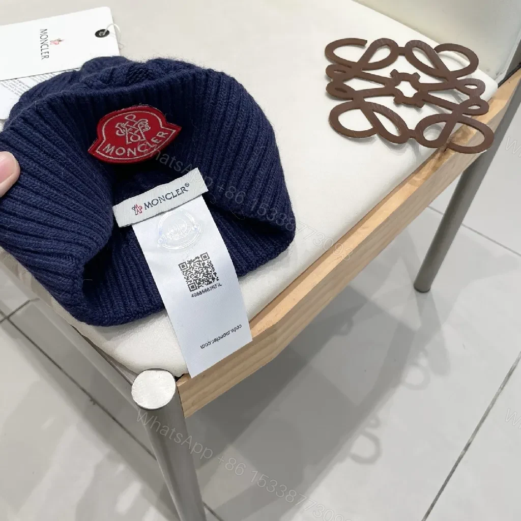 View 8 of Cozy Navy Knit Beanie with Ribbon Patch