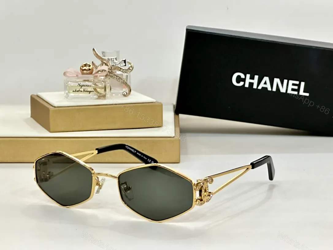 View 6 of Chic Micro-Refined Sunglasses with Chanel Detailing Edge