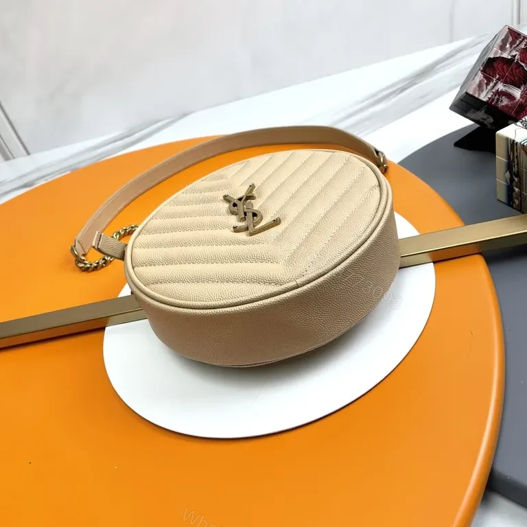 View 2 of Quilted Circular Crossbody Bag with Gold-YSL Emblem