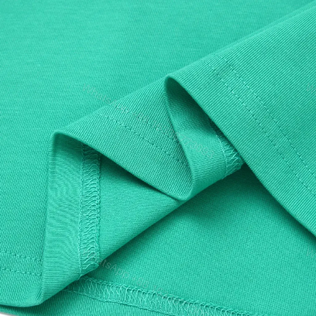 View 9 of Green Stone Island Crest Tee: Premium Cotton, Relaxed Fit