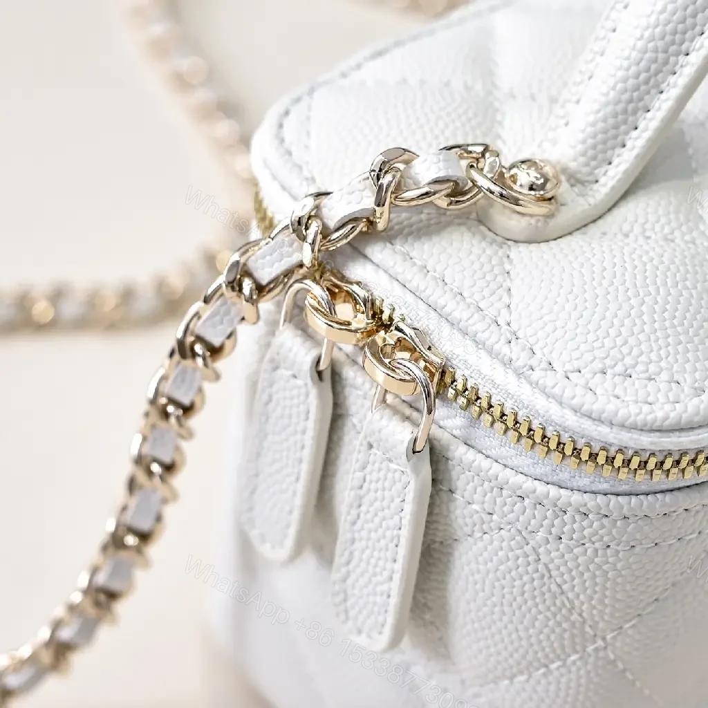 View 3 of Quilted White Belt Bag with Gold Emblem, Compact Luxury