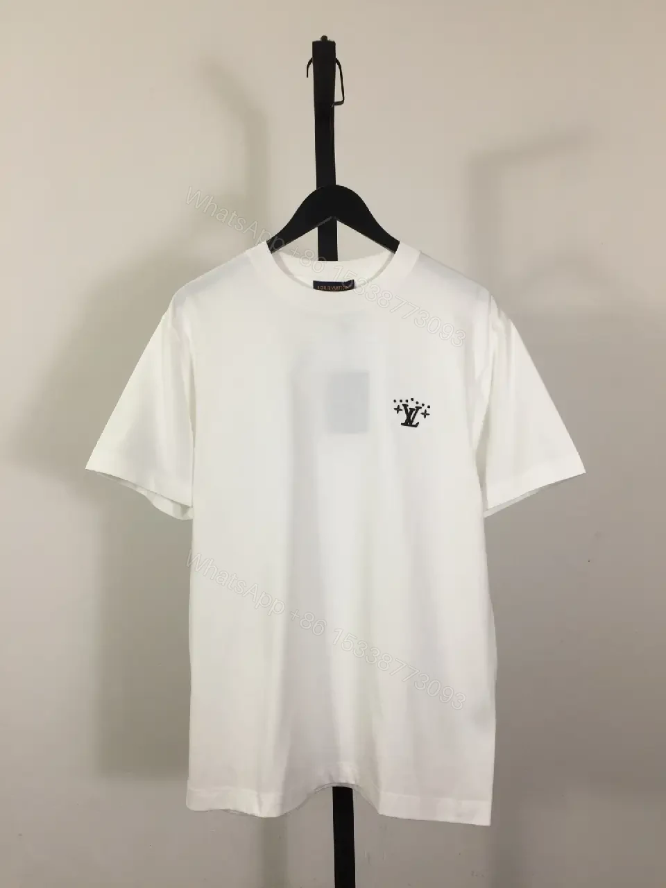 View 2 of Minimalist White Tee: Subtle LV-Inspired Emblem, Premium Cotton Blend