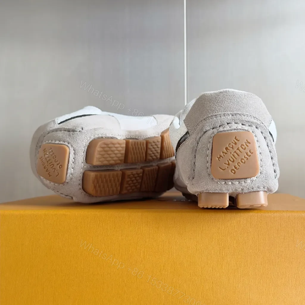 View 9 of Chic White Suede-Accented Luxury High-Tops: Signature Style