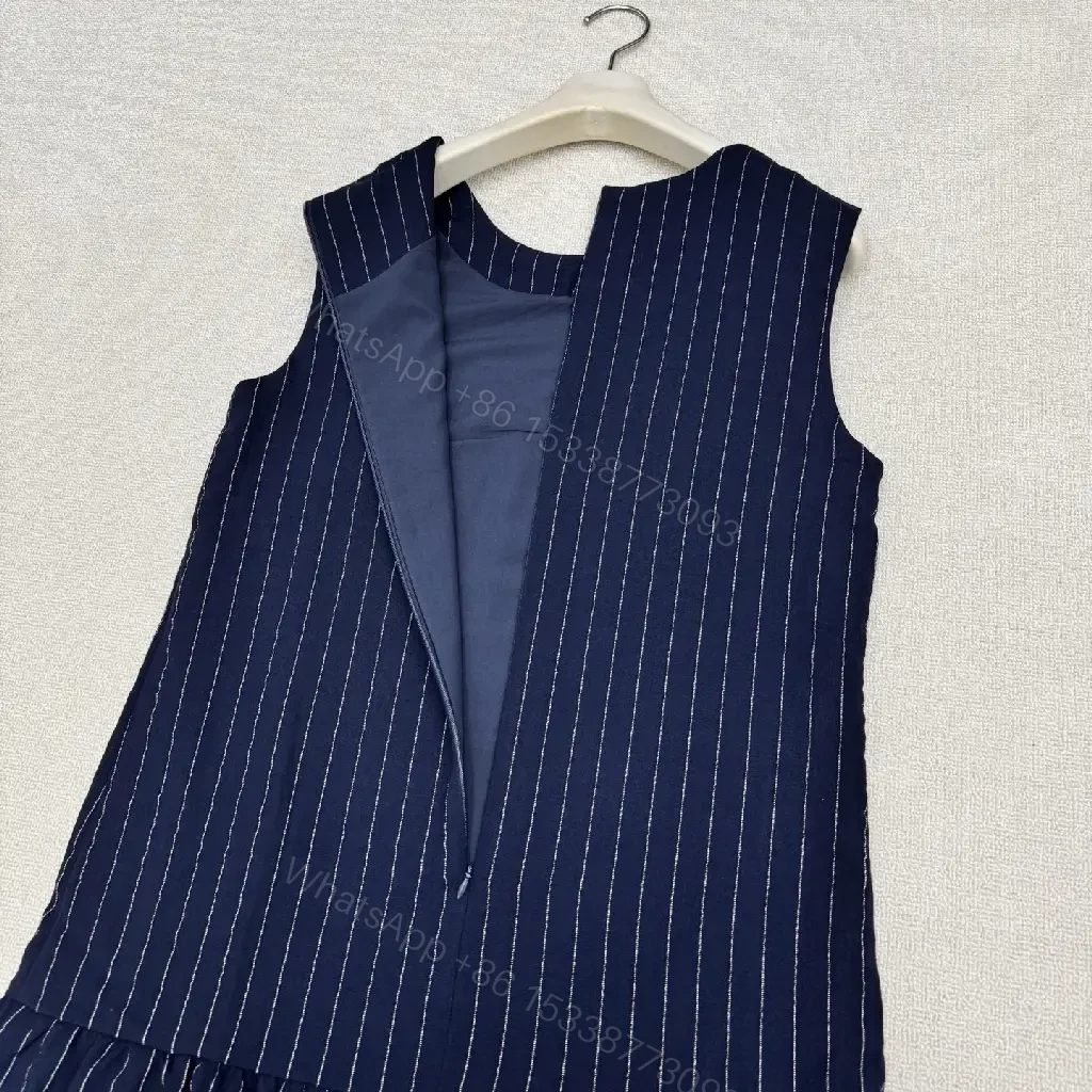 View 6 of Navy Pinstripe Cotton A-Line Dress with Chanel Logo Key Feature