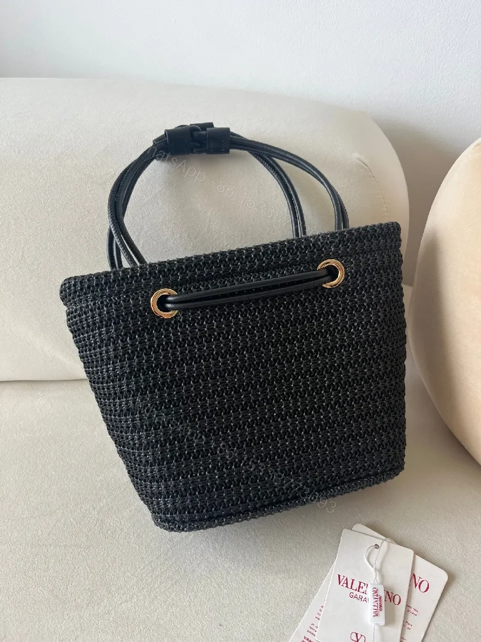 View 2 of Compact Black Knit Bag with Gold Hardware: Everyday Luxury Bag