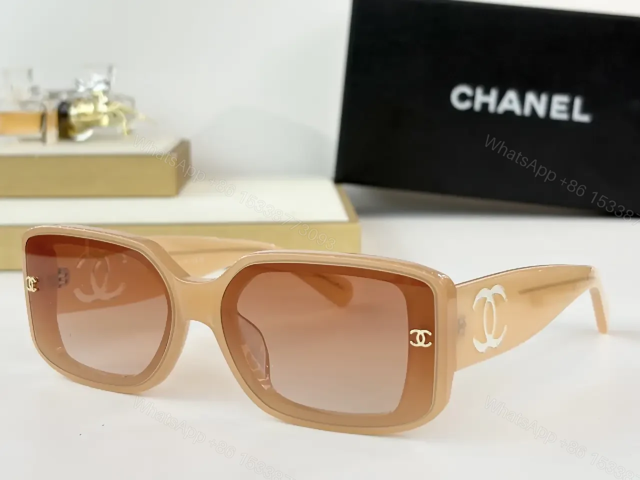 View 9 of Bold Black Acetate Rectilinear Sunglasses, Gold Accents, UV400 Protection