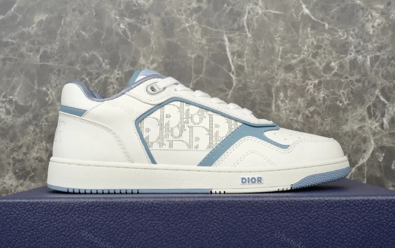 View 5 of Soft-White Leather Sneaker with Blue Accents and Signature Texture