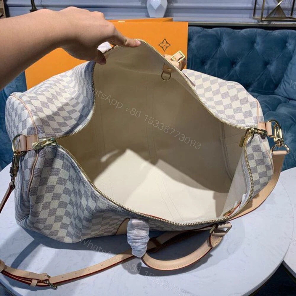 View 14 of Louis Vuitton Keepall Bandouliere 55 Damier Azur Canvas 55Cm LV N41429