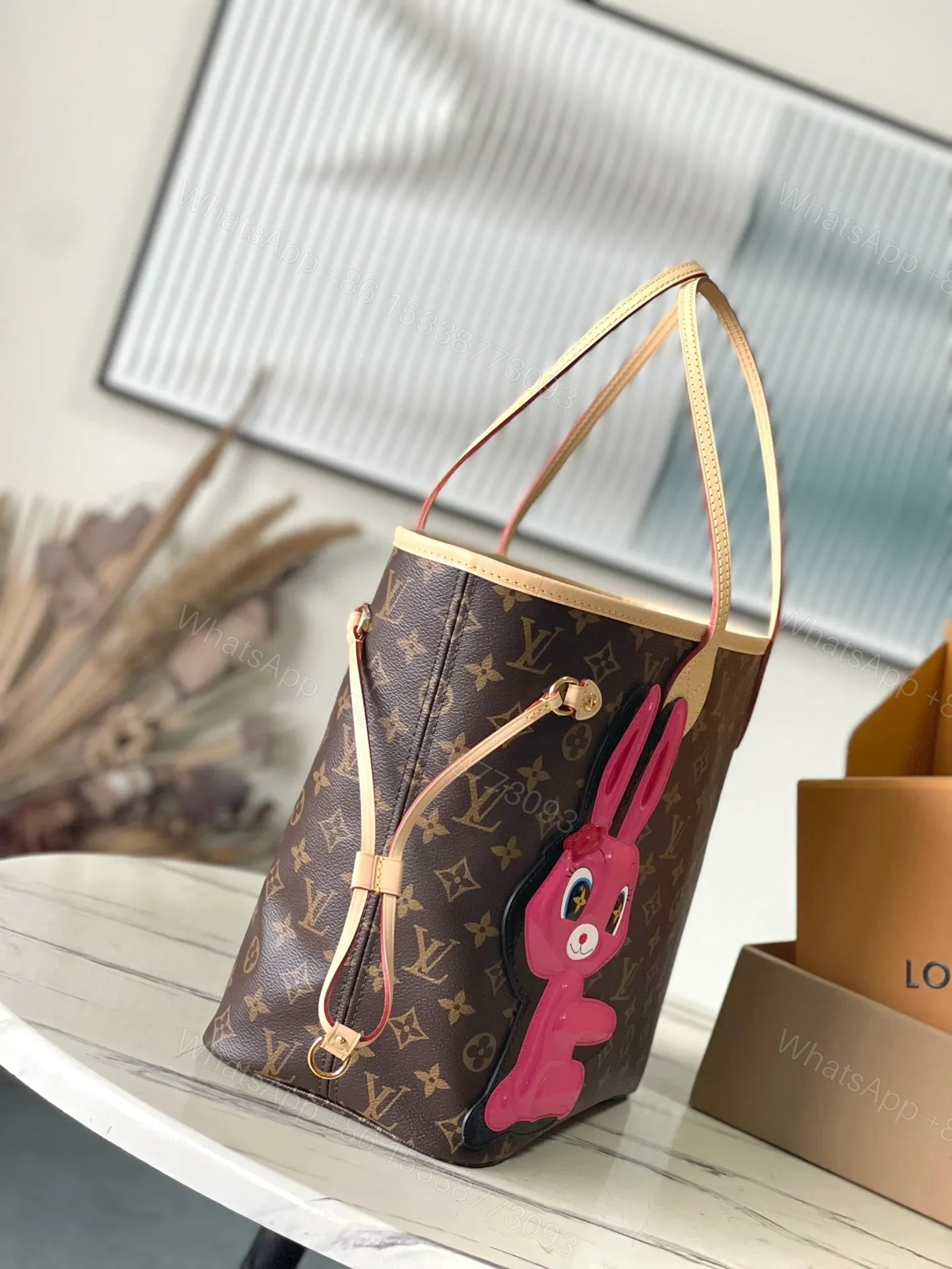 View 8 of LV NEVERFULL MM IN BROWN MONOGRAM CANVAS WITH PINK RABBIT PATCH