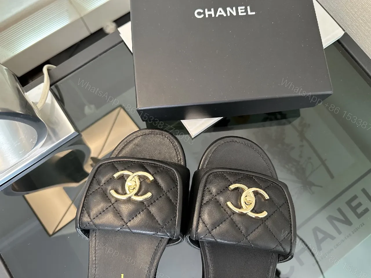 View 3 of Quilted Black Slide with Gold Logo – Casual Luxe Footwear