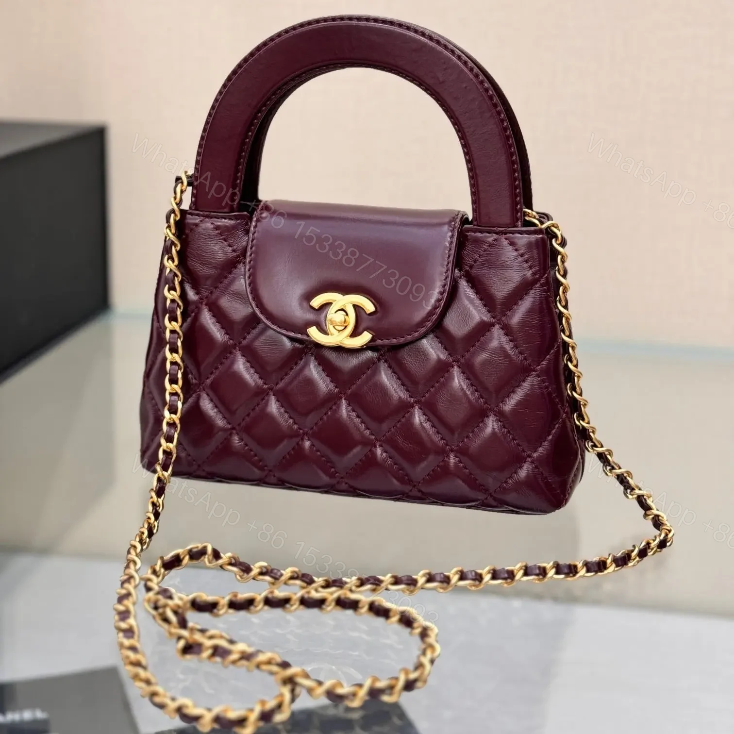 View 3 of CHANEL KELLY 19 IN WINE RED LAMBSKIN WITH GOLD HARDWARE