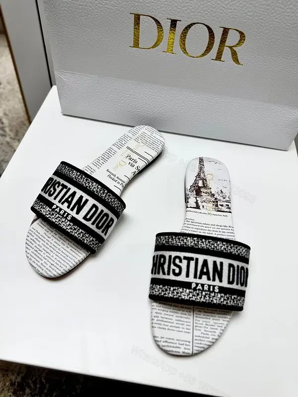 white textile slide sandal with monogram pattern luxury logo strap for everyday luxury — view 1