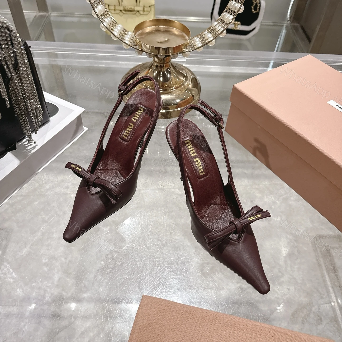 View 3 of Miu Miu Slingback Pumps With Bow Red