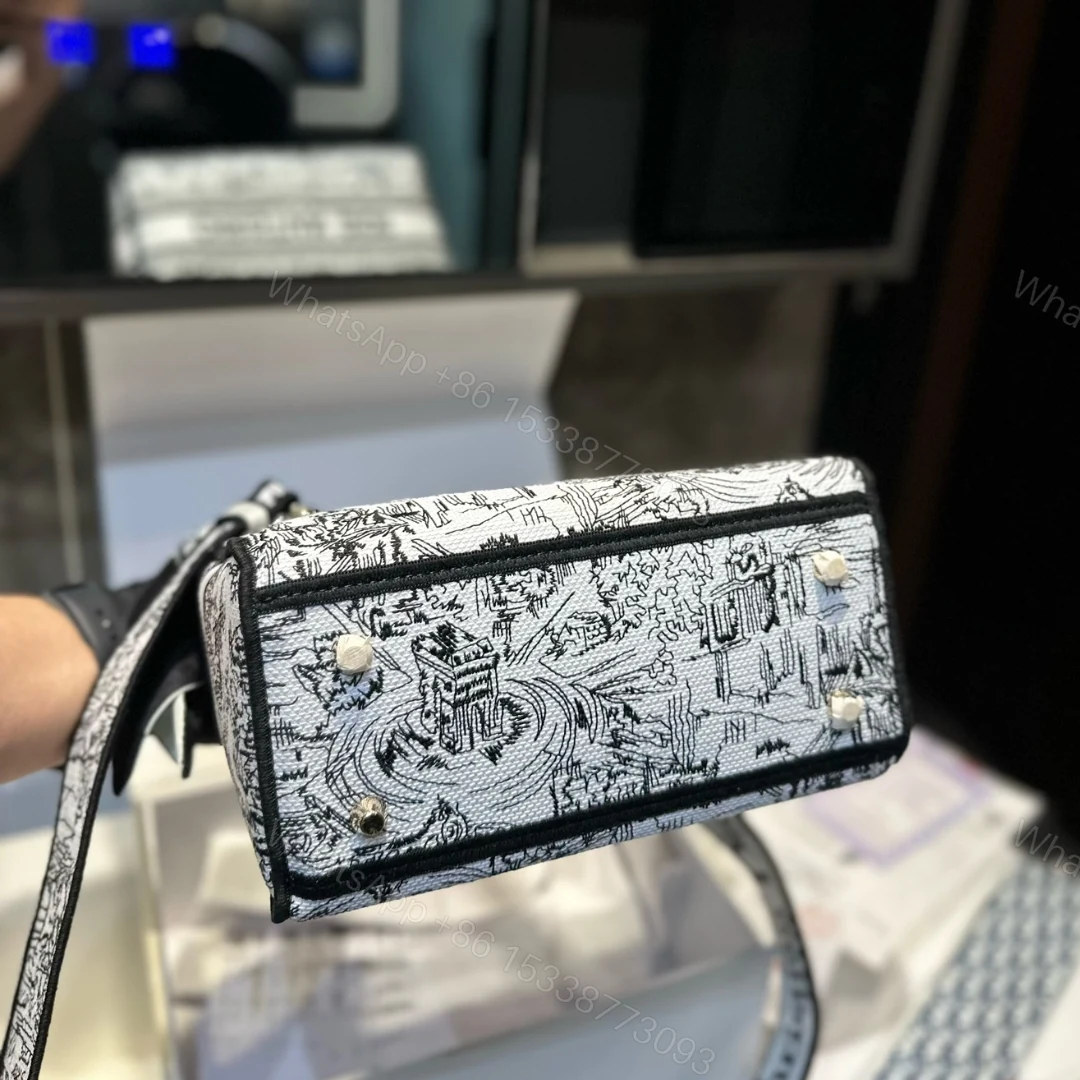 View 8 of DIOR MEDIUM LADY D LITE BAG PARIS ALLOVER EMBROIDERY WHITE AND BLACK 24CM M0565OEGI M933