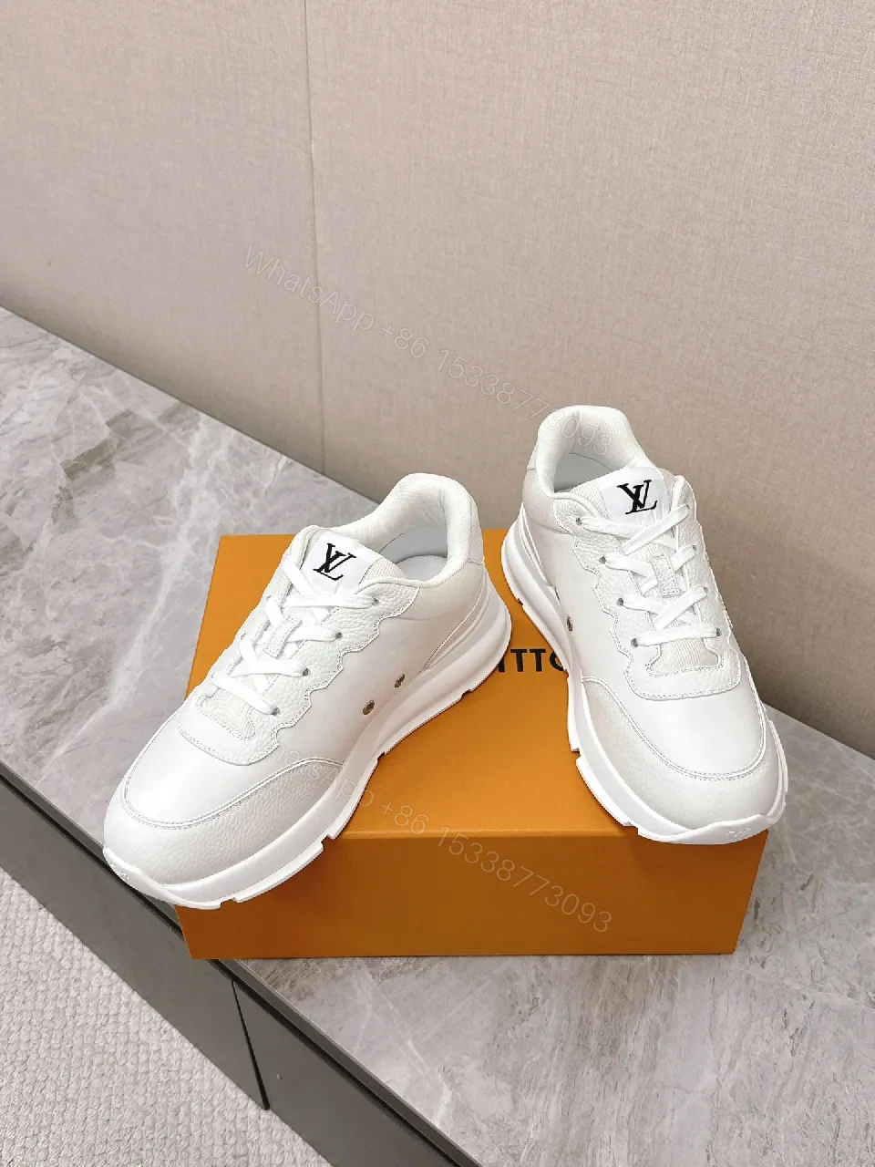 View 9 of White Leather Low-Profile Sneakers with Monogram Detailing