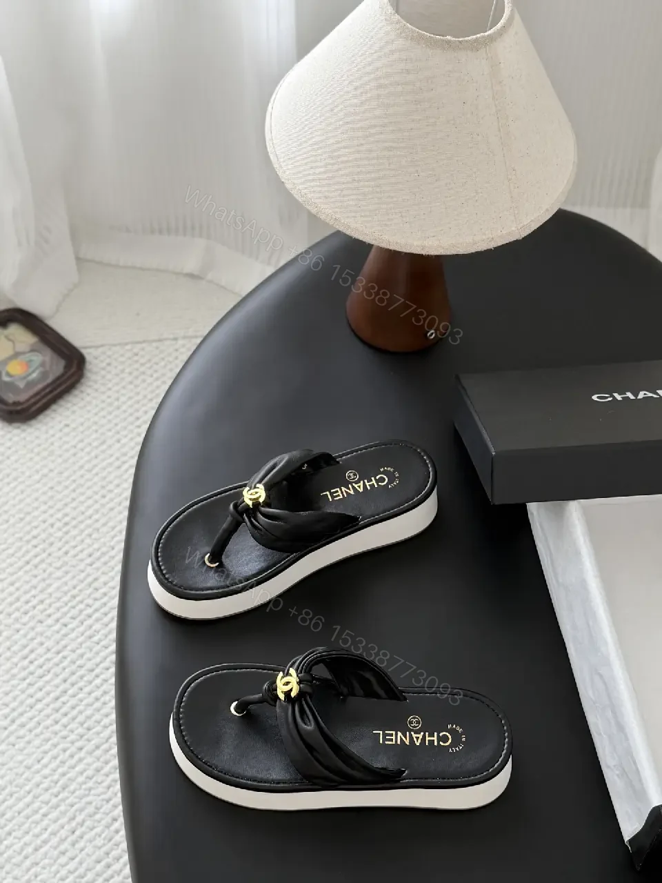 View 3 of Black Leather Slide Sandals with Gold Chanel Logo