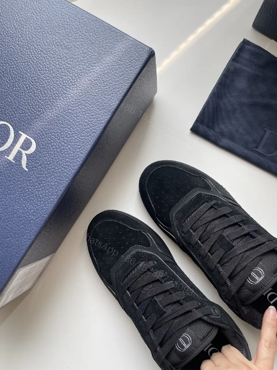 View 3 of Black Texture-Detail Sneaker: Subtle Luxe, All-Day Comfort