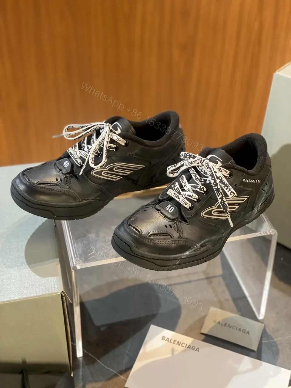 All-Black Leather High-Top Sneaker with Bold Accents — view 1