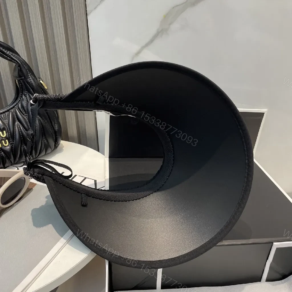View 8 of Chic Black Visor Hat with Dior Band: Elevated Everyday Style
