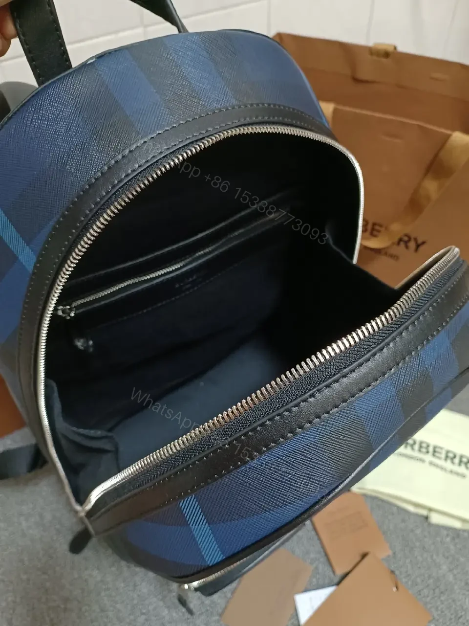 View 3 of Bold Check Pattern Leather-Accented Backpack for Everyday Luxury