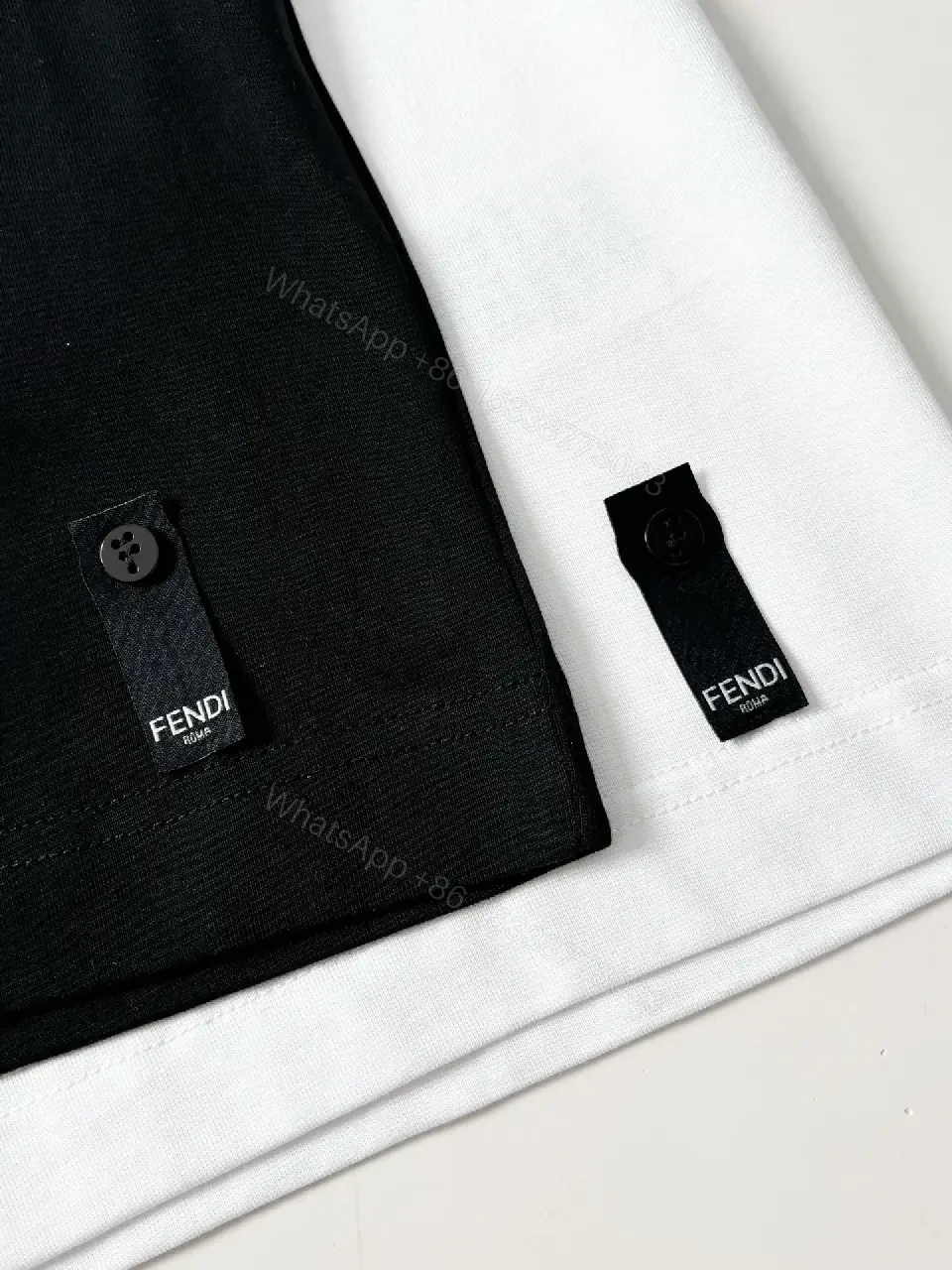 View 3 of Black Knit Tee with Bold Contrast Logo, Minimalist, Everyday Comfort