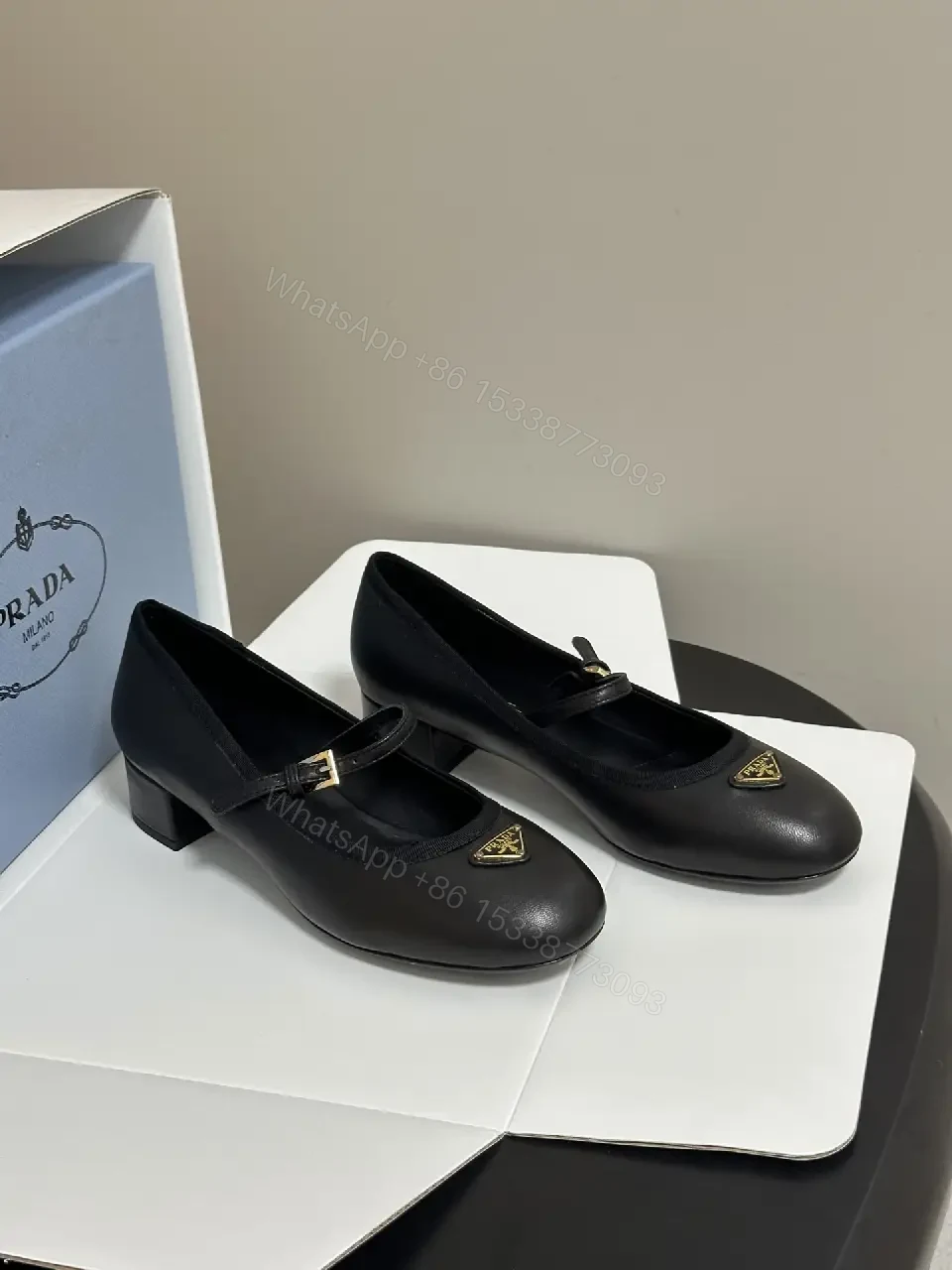 View 5 of Black Leather Mary Jane Heels with Logo Charm, Prada Style