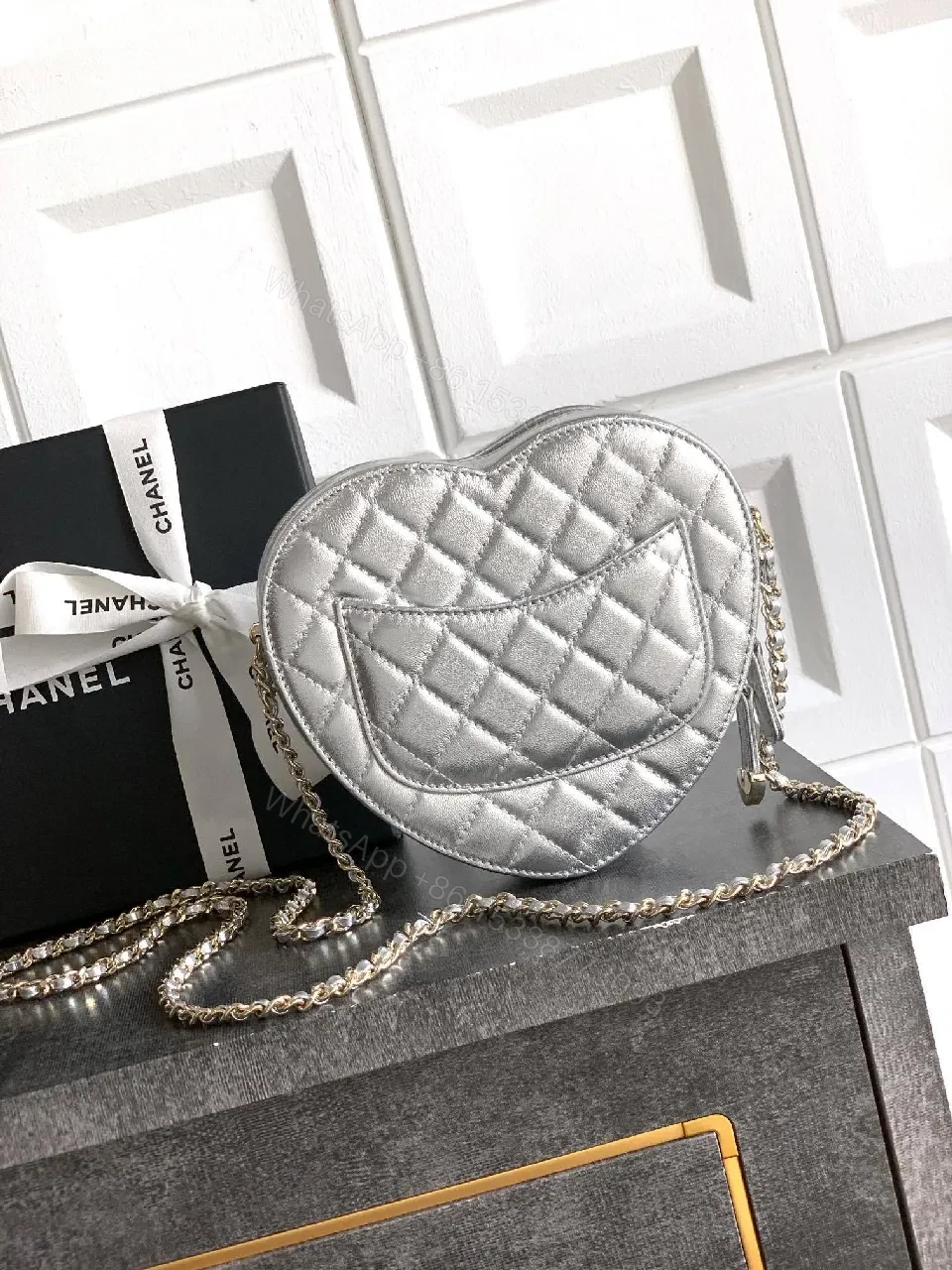 View 9 of Heart-Shaped Quilted Metallic Bag with Gold Hardware