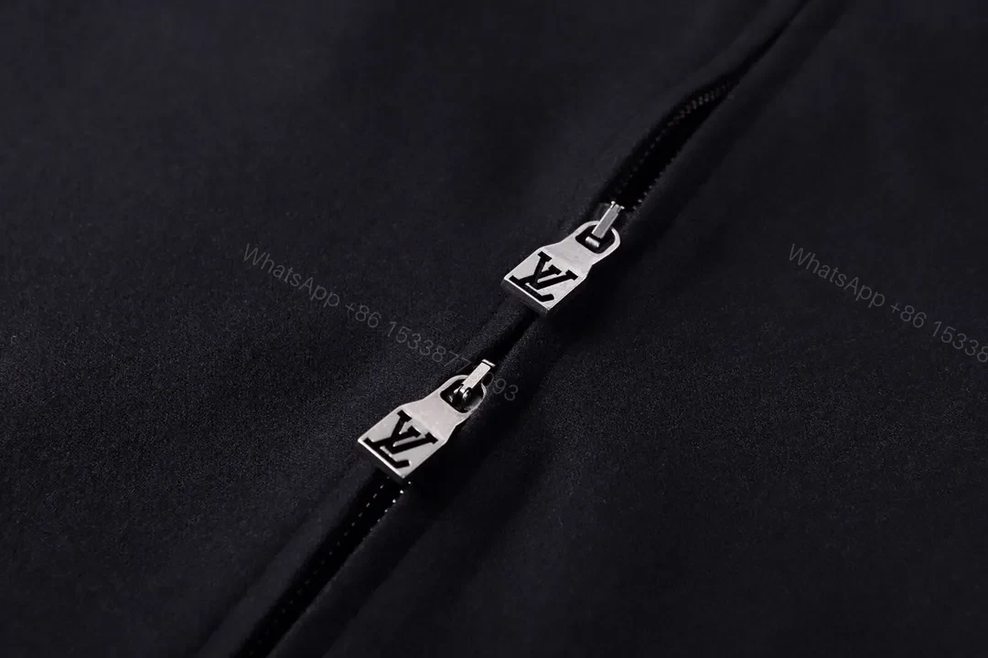 View 5 of Classic Black Zip Hoodie with Subtle LV Accent — Essential, Versatile Luxury