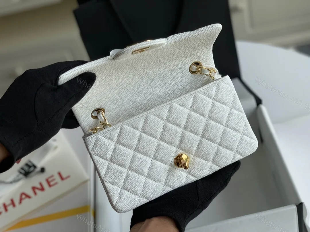 View 7 of Ivory Quilted Leather Mini Flap Bag - Elegant Everyday Luxury
