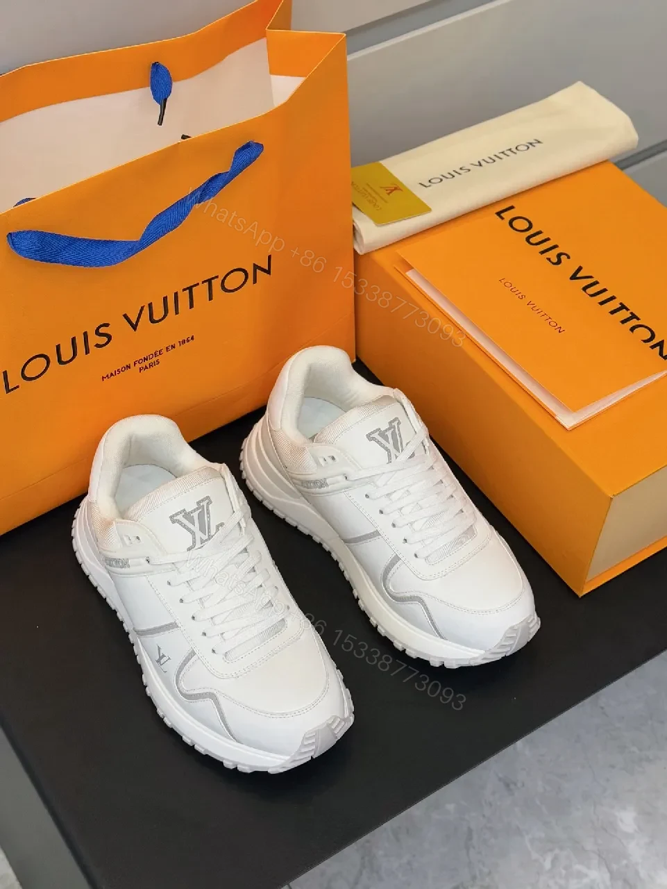 View 8 of White Leather Luxury Trainers with Structured Comfort