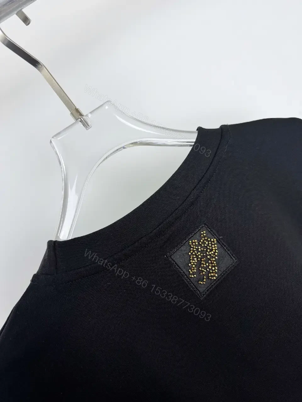 View 3 of Black Cotton Tee with Gold Sequin Logo, Luxe Everyday Streetwear