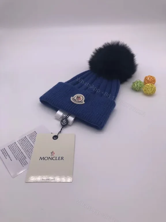 View 7 of Chic Black Moncler Knit Beanie â€” Plush Pom, Luxe Warmth
